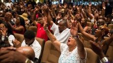 Mourners fill huge church for Michael Brown's funeral, urge black Americans to take action