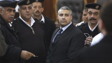 Mohamed Fahmy voices frustration as retrial postponed to next month