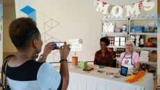 Artist puts moms in a museum - real moms