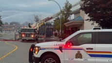 A multi-storey building under construction was destroyed by fire, mayor says