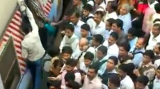 Watch How People Board The Mumbai Local Train