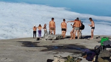 Two Canadians Barred From Leaving Malaysia After Allegedly Posing Naked Atop Country's Highest Peak