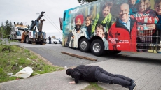 PIC: NDP Bus Spins Its Wheels As All Parties Leaders Push Before Tuesday's Election