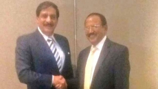 India, Pakistan begin talking again - in Bangkok