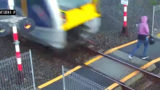 WATCH: New Zealand Woman Comes In Front Of A Train; Escapes Death By A Whisker
