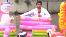 VIDEO: This Pakistani Reporter Goes Overboard To Cover Monsoon Floods
