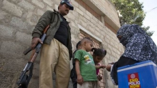 Taliban Faction Kills Seven Cops Gaurding Polio Team In Pakistan