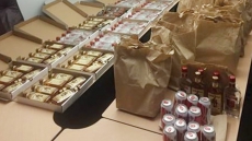 Edmonton Police Say Pizza Place Was Delivering Liquor, Beer In Pie Boxes