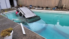 Officer rescues pair from Surrey, B.C., pool
