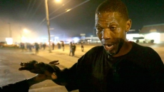 Police, protesters collide in Ferguson, a day after National Guard arrives in St. Louis suburb