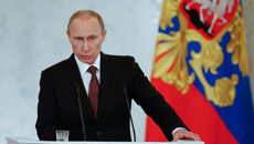 Putin signs Crimea's accession into law