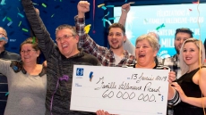 Quebec Couple Pick Up $60-Million Cheque After Winning Big In Lottery