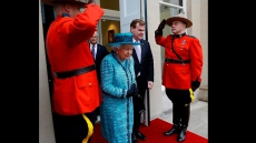 Baird greets Queen at Canada House in London as 'foreign affairs minister'