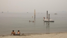 Rain helps wildfire efforts, but isn't enough