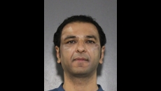 Man charged with sexual assault in relation to modeling agency scheme