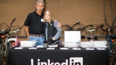 Guess Who's Coming To Work? Mom & Dad Step Into The Cubicle On Bring In Your Parents Day