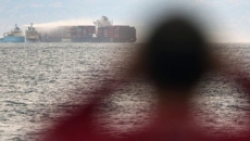 Contractor to try to recover overboard containers