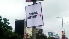 WATCH: Man Puts Up 300 Billboards and Signs Overnight to Ask Girlfriend's Forgiveness