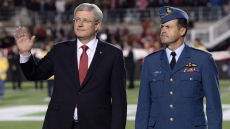 PM Stephen Harper Helps Redblacks Fans Remember Victims