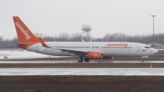 Sunwing party flight organizer blames airlines