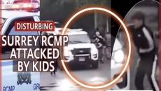 WATCH: KIDS SWARM RCMP OFFICERS IN SURREY - 3 ARRESTED
