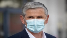 Liberal leader calls for three TV debates