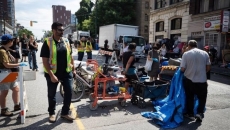 Woman charged after officers 'swarmed': police