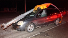 RCMP Say Impaired Winnipeg Driver Hit Traffic Light Standard, Continued With It On Hood