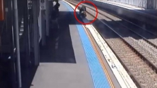 VIDEO: Mom Miraculously Saves Baby Rolling Towards Railway Tracks