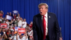 Trump threatens to hike tariffs on Canadian autos, steel to 50% in January