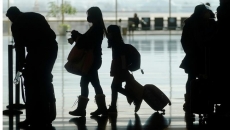 Canadians, Americans divided on vaccine 'passport'