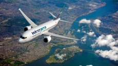 WestJet to charge fee for first checked baggage in economy fares