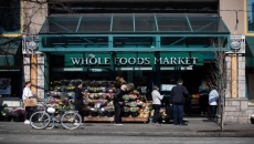Whole Foods will let employees wear poppies after drawing ire for its earlier ban