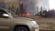 Second Day Of Convoy To Move Wildfire Evacuees South From Fort McMurray