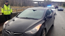 Metal Flies Off Truck, Smashes Through Newfoundland Woman's Windshield