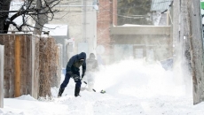 Winter wallop continues across Canada, cancelling classes and stranding trucks