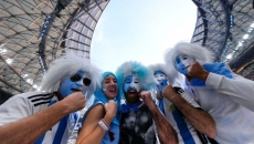 Some of the most dedicated World Cup fans skipping this year's tournament, citing costs and politics