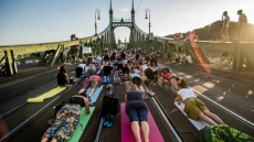 Hundreds Take Part In Yoga Classes On Bridge In Budapest
