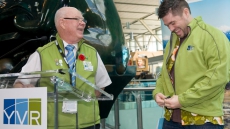 Vancouver Airport Volunteer Helps Travellers Get To Their Destination