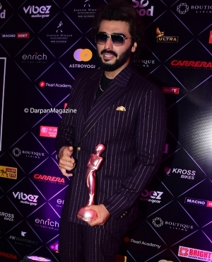 Arjun Kapoor dazzles in blue and gold stripped suit