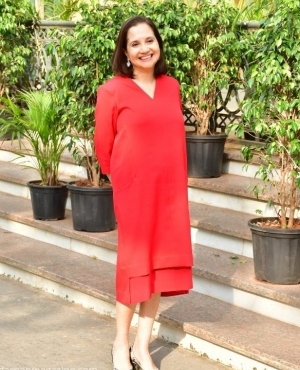 Anupma Chopra looks cute in her red dress and high heels 