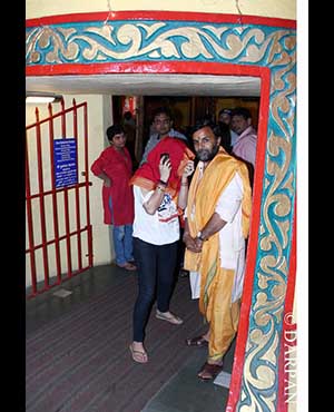 Preity Zinta snapped hiding from the cameras at a Mumbai temple