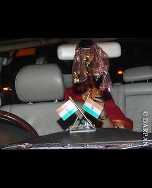 Preity Zinta snapped hiding from the cameras at a Mumbai temple