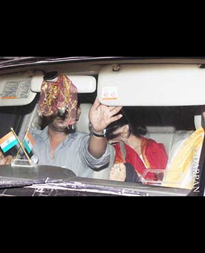 Preity Zinta snapped hiding from the cameras at a Mumbai temple