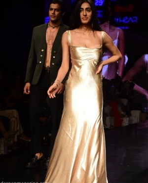  Tiara Dhody strikes a pose in her gold dress 