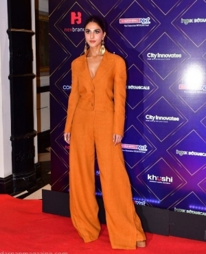 Vaani Kapoor opts for an orangeish blazer and wide pants 
