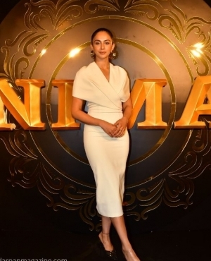  Rakulpreet Singh stuns in her white dress with stilettos and gold earrings 