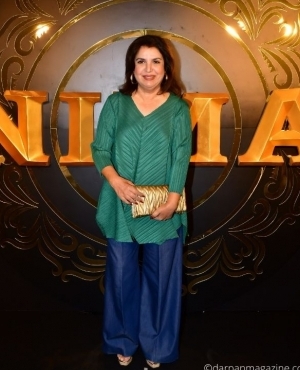  Director Farha Khan wears a green kurta with blue pants 