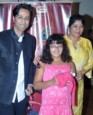 Salim Merchant with wife and kids