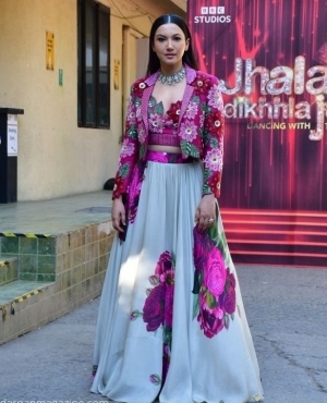 Gauahar Khan is a flower in pink and red 